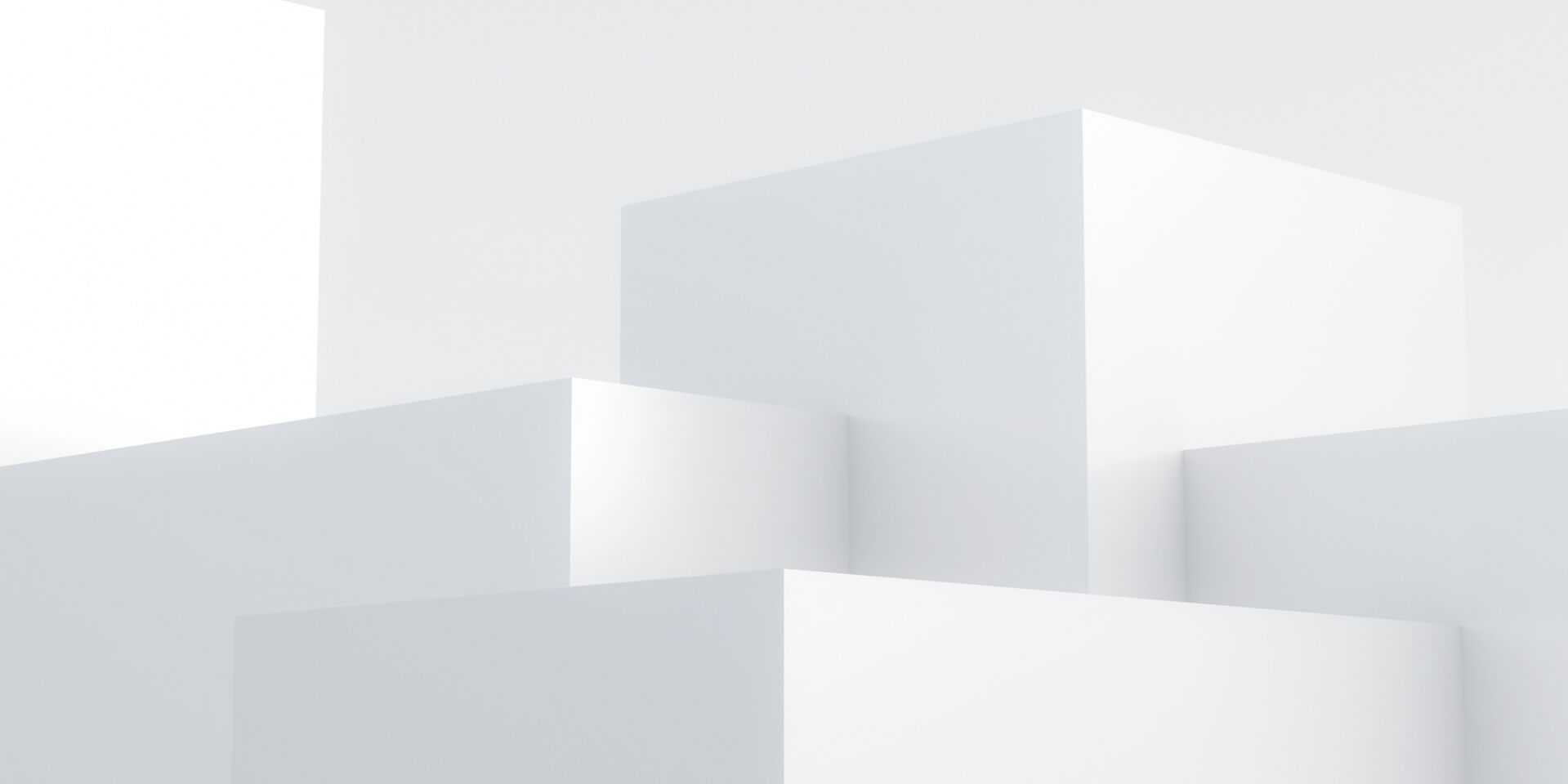 Eine abstrakte Abbildung von verschiedenen 3D-Quadern auf einem weißen Hintergrund